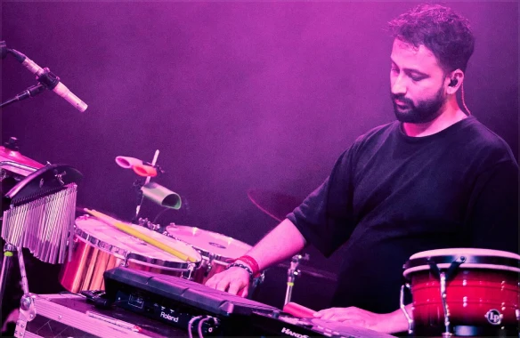 Krishna Kishor, multi-percussionist and music producer featured in the Atlas plugin artist showcase.