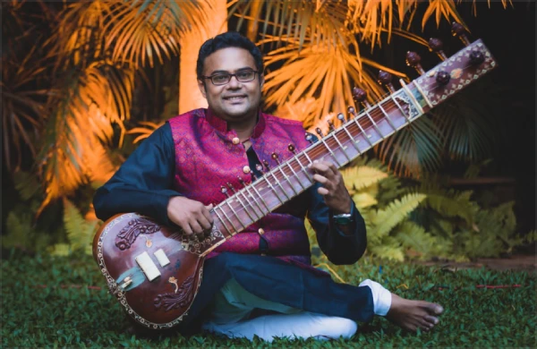 L Kishore Kumar, renowned Indian film industry sitarist from the Atlas artist collection.